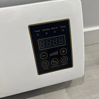 Photo of the unit near a bed